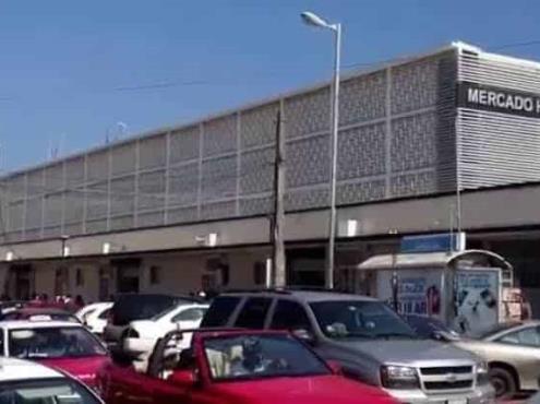 Ante semáforo naranja en Veracruz, locatarios abren negocios