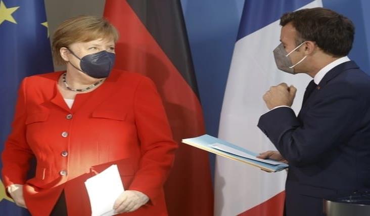 Merkel y Macron instan a endurecer medidas contra la variante Delta