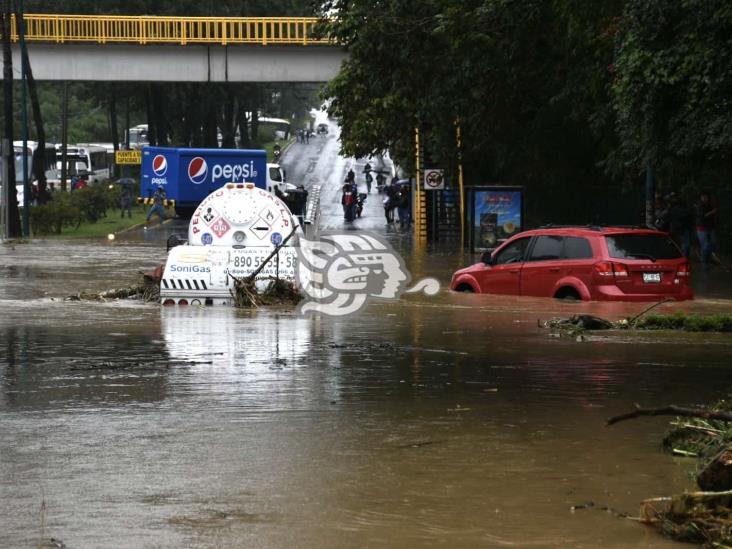 Inundaciones y ataúdes a la deriva, estragos de ‘Grace’ en Xalapa