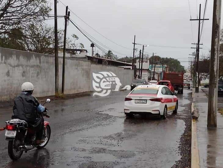¡Cuidado con los baches! lluvia impide ver afectaciones en calles de Veracruz