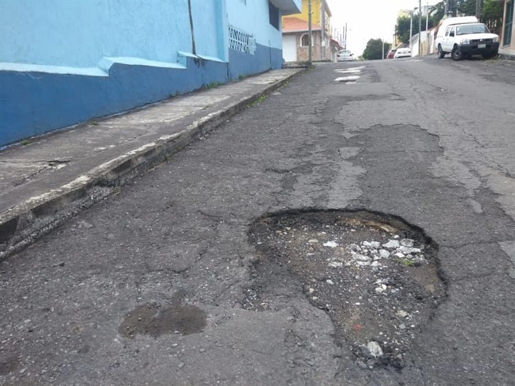 ¿Cuáles son las causas de que haya baches y socavones en Veracruz?