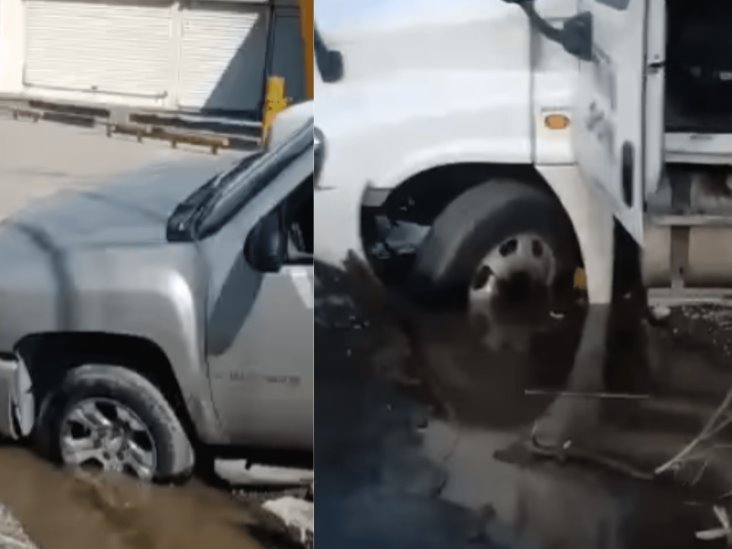 Tráiler y camioneta caen en socavón que se formó en fraccionamiento de Veracruz