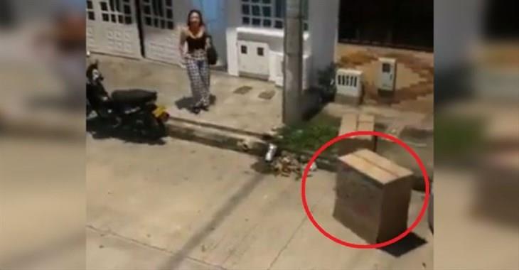 Mujer descubre infidelidad y la amante huye en una caja de cartón (+Video) 