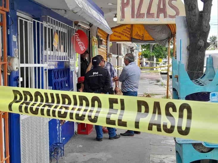 Catean local en Veracruz puerto; hallan restos humanos