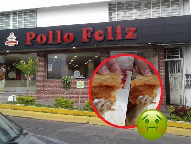 Pollo Feliz en Xalapa sorprende a cliente con objeto metálico en su comida