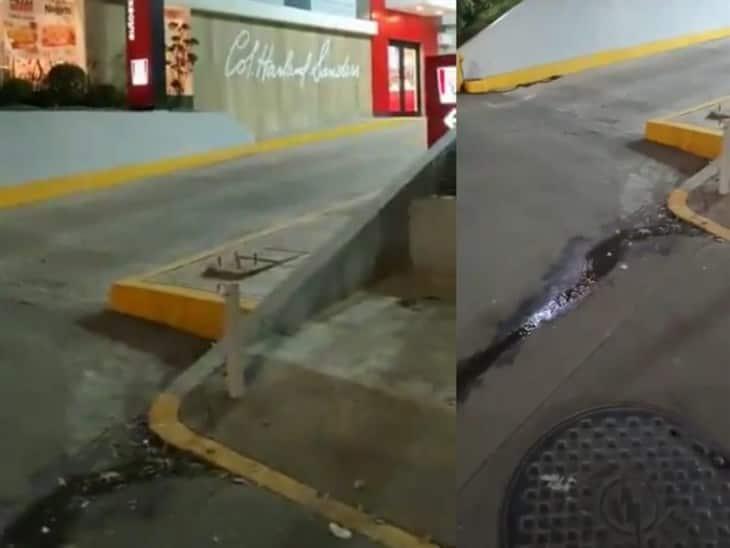 KFC de Xalapa sigue drenando agua con desperdicios sobre la avenida Lázaro Cárdenas